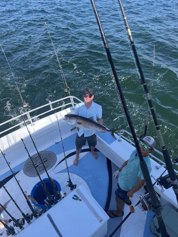 The spacious fishing deck of the Rip Tide underway on the Gulf