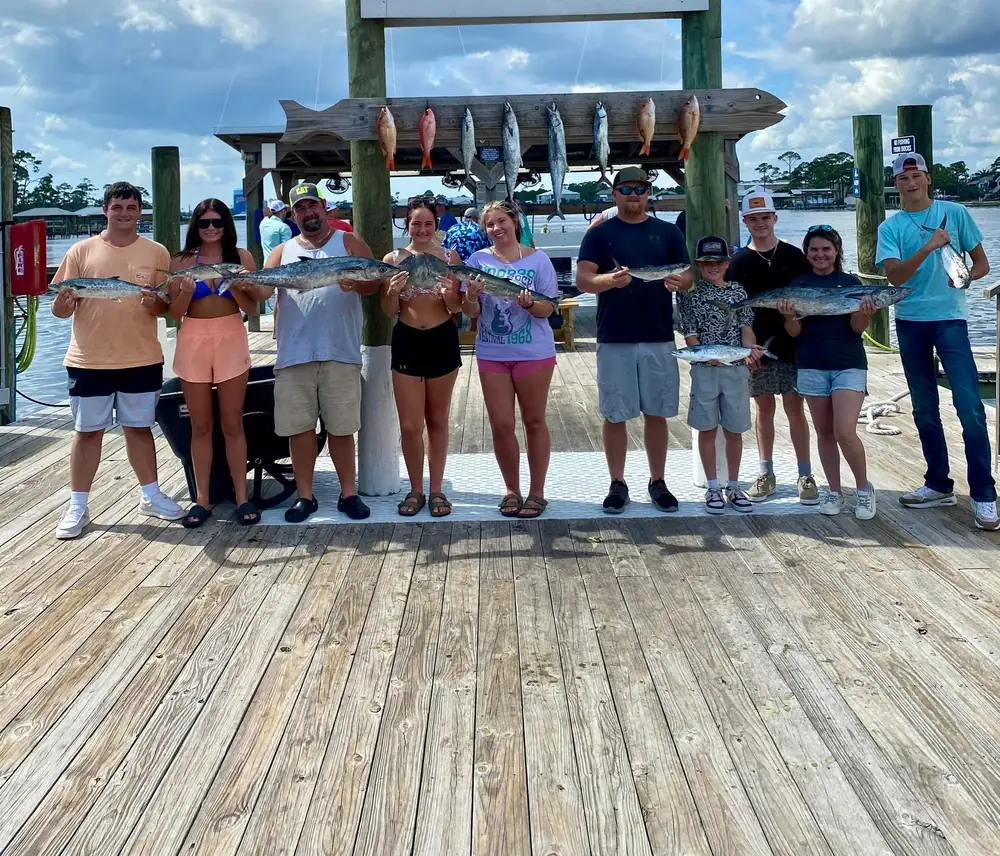 A large group with their snapper catch at Zeke's Landing