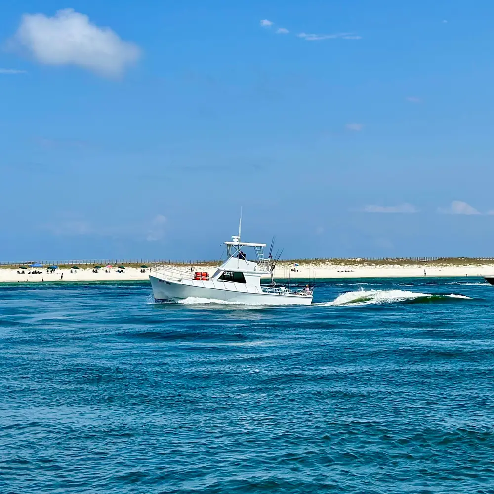 A Riptide charter boat running across the Gulf