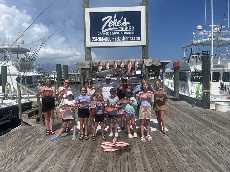 A large family charter with a full rack of red snapper