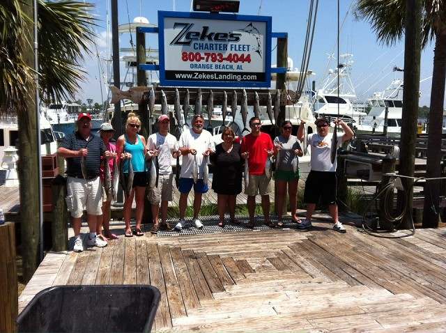 Anglers at the Zeke's Landing fish rack after a morning trip